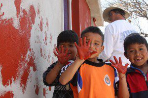 Children at play during Momentum Factor's trip to build home in Mexico for local family